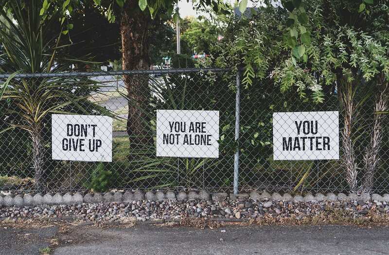 Don't give up, you are not alone, you matter signs